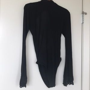Free People long sleeve black body suit